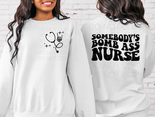 Somebody’s Bomb Ass Nurse Graphic Tee